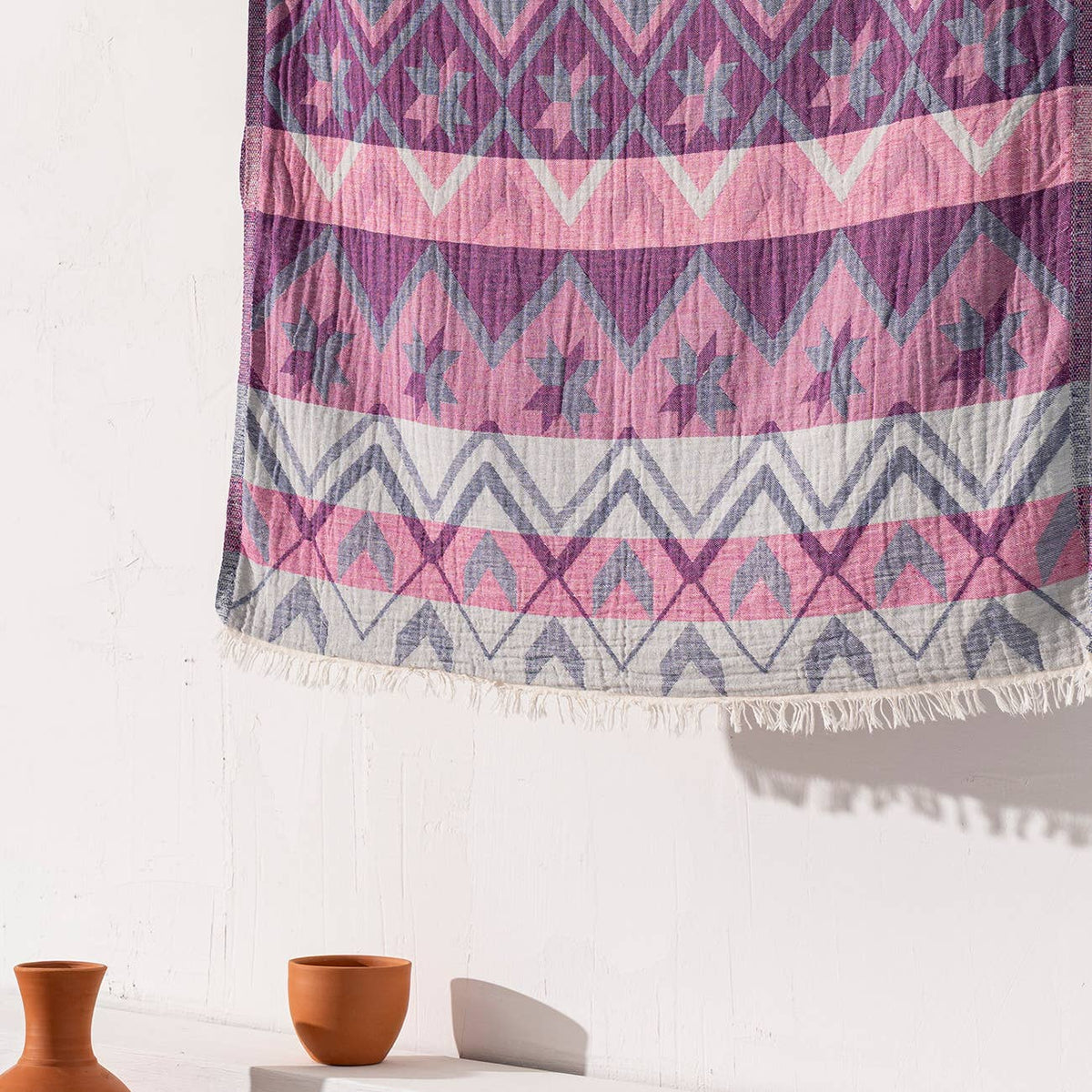 Ethnic print Turkish beach towel in pink and purple, 33x66 in | Kikoya
