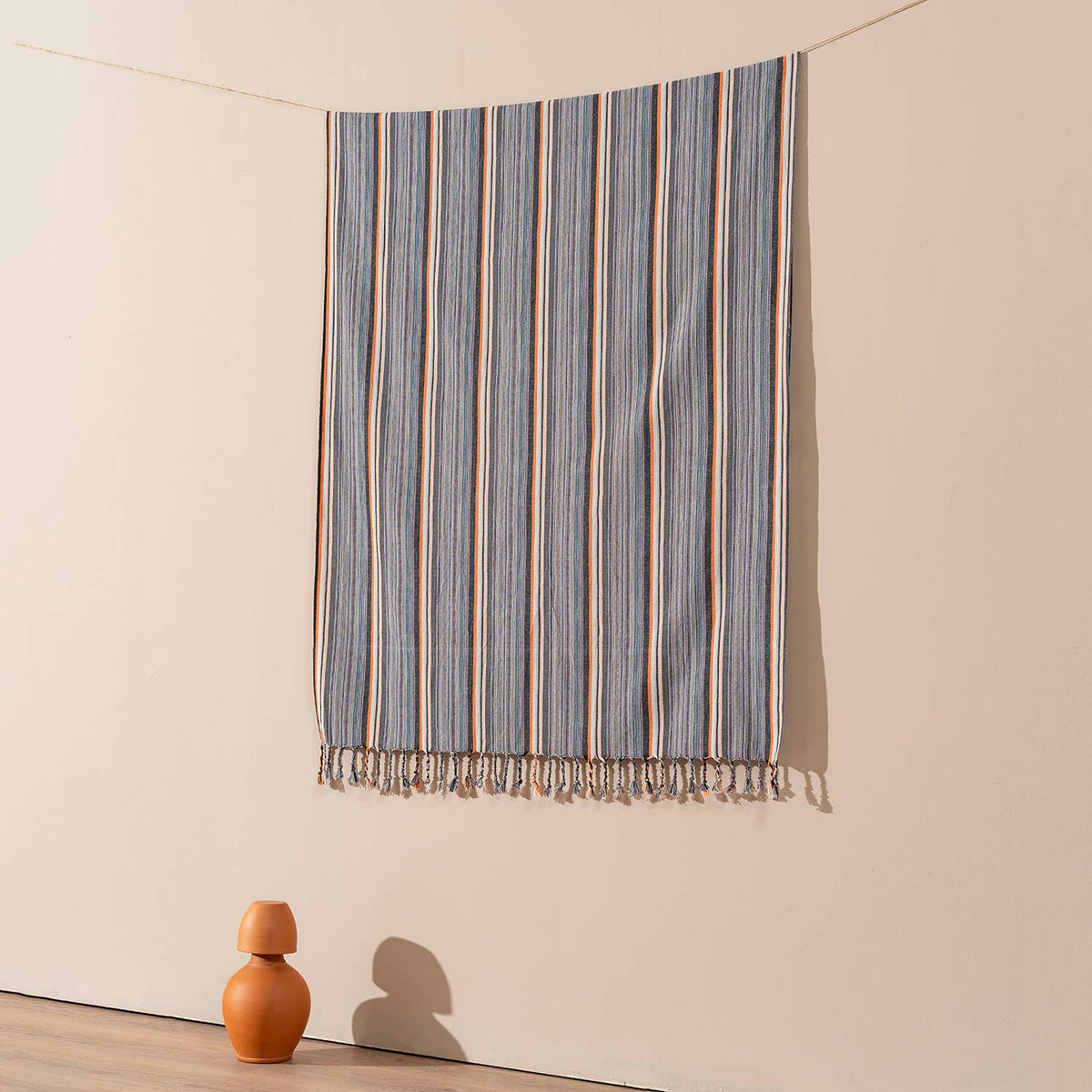 Tangerine & Stone Stripe beach towel folded | Kikoya