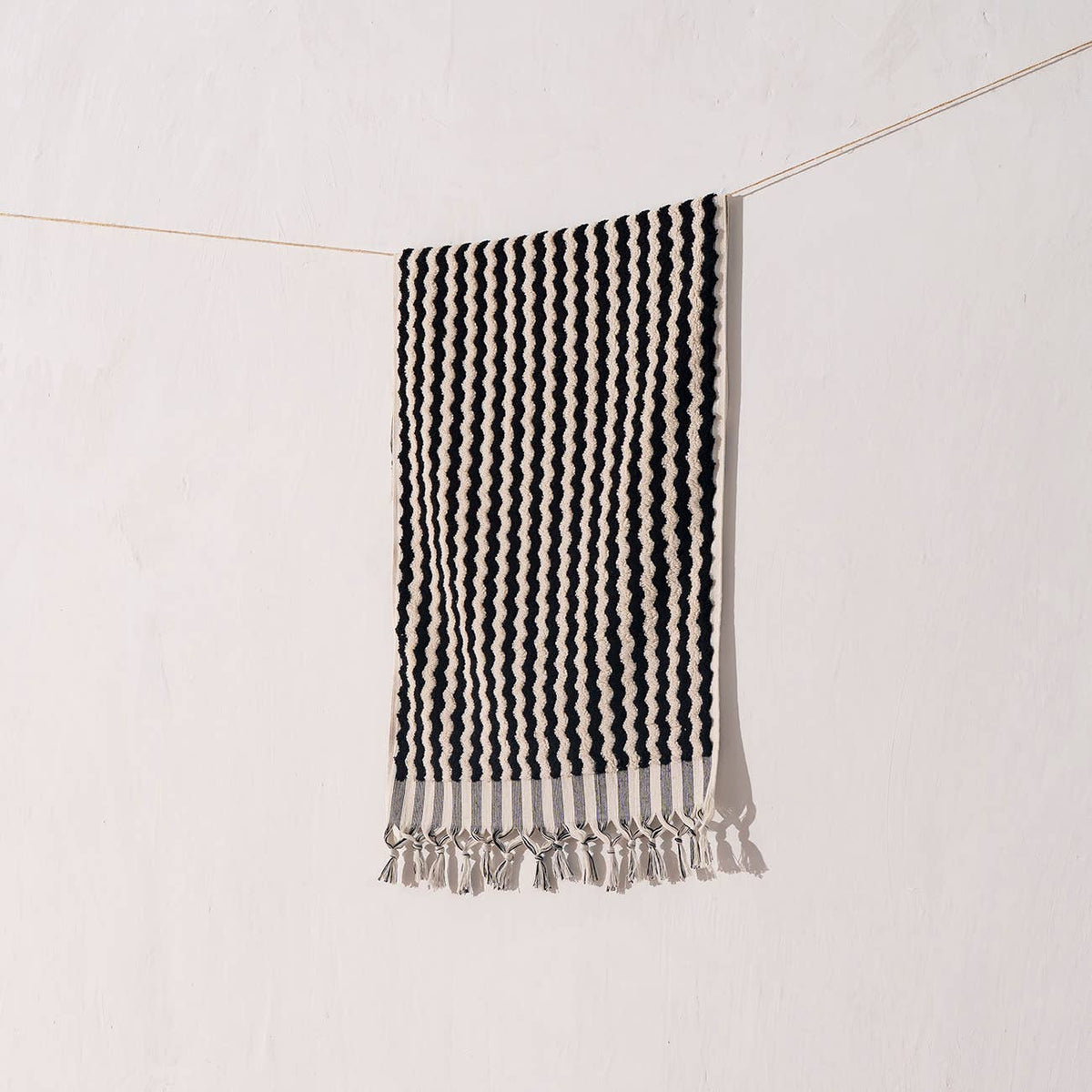 Pompom zigzag Turkish hand towel in black and natural, 17x38 in, handloomed | Kikoya