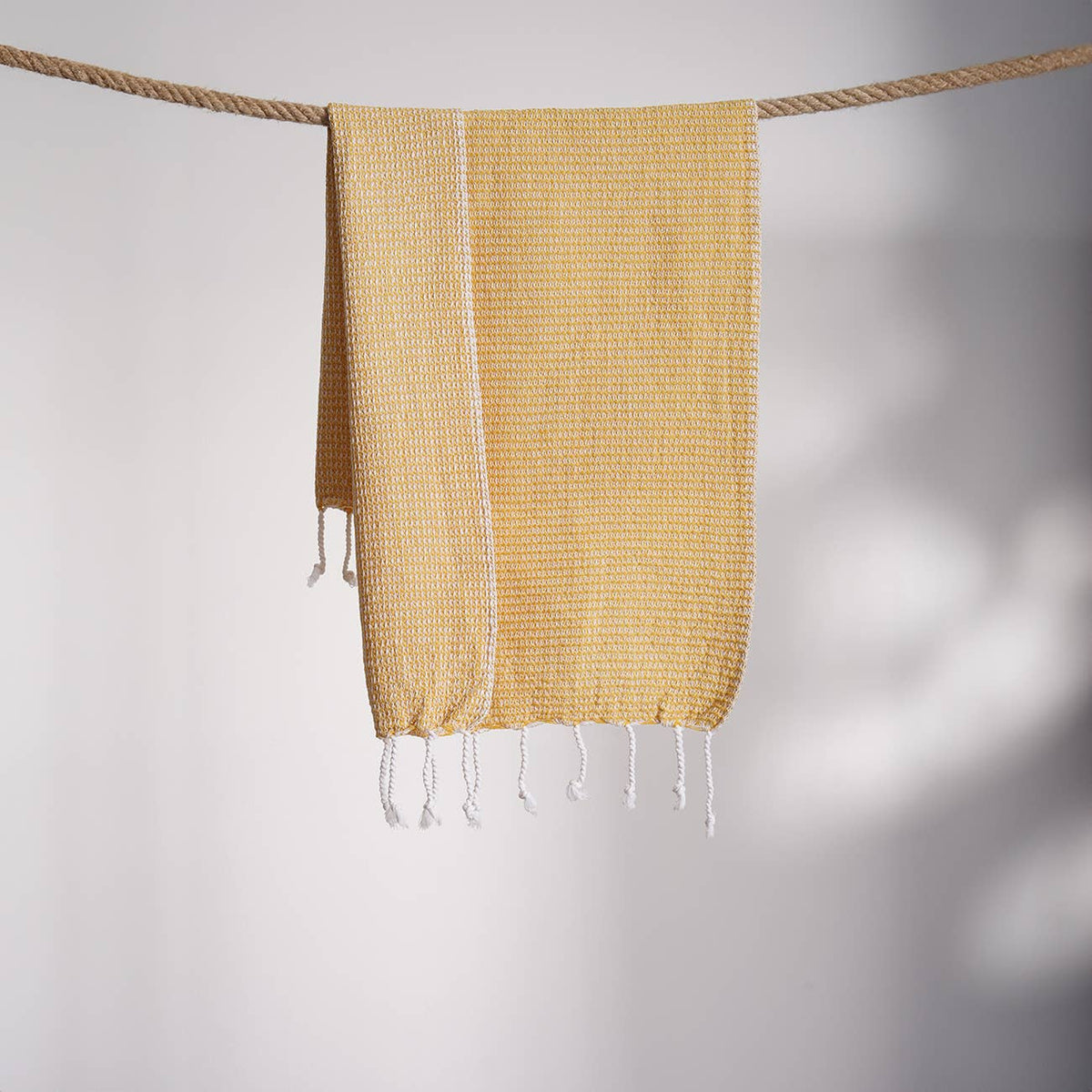 Micro waffle Turkish hand towel in a plain colour with knotted fringe | Kikoya
