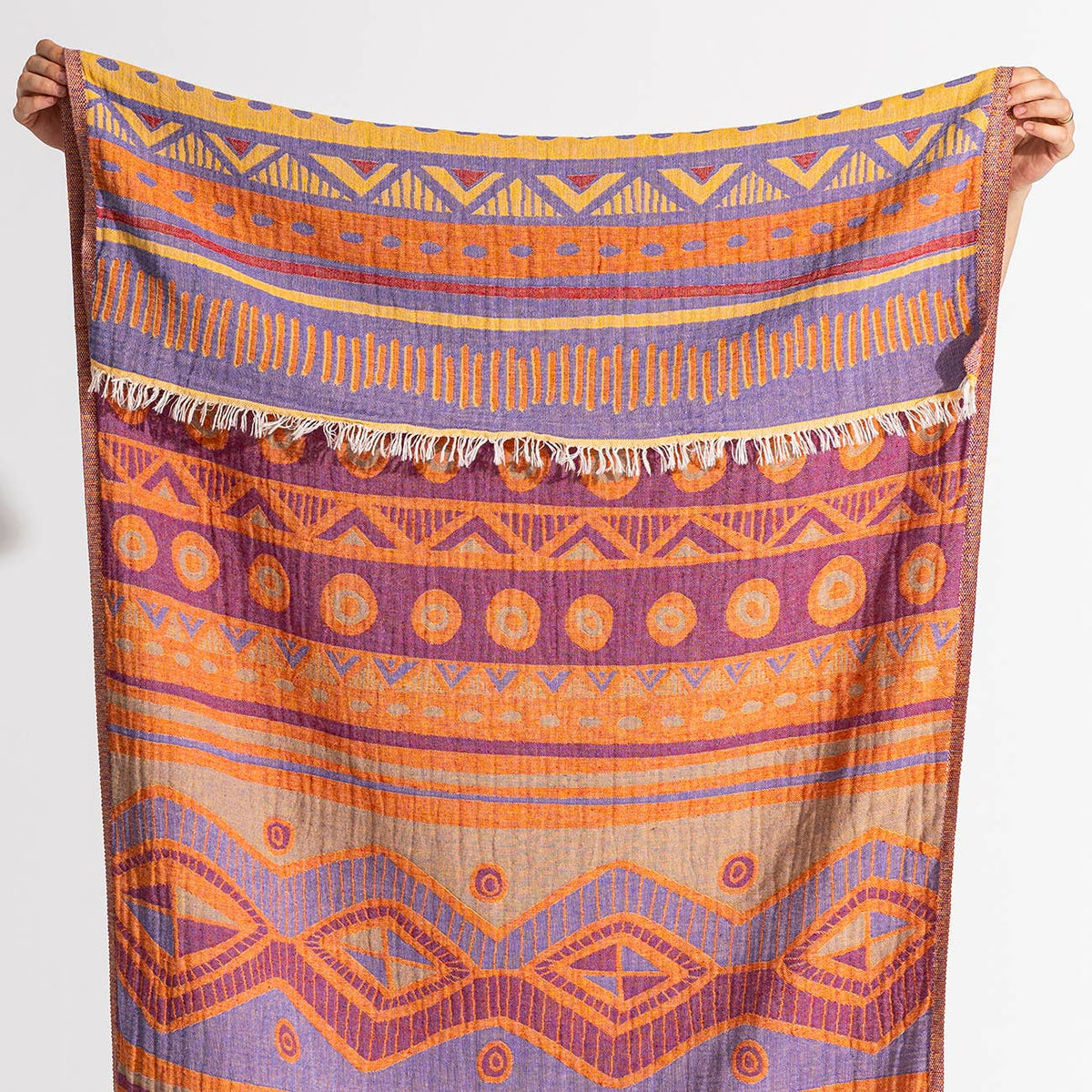 Ethnic jacquard Turkish beach towel in orange and purple, flat-woven | Kikoya