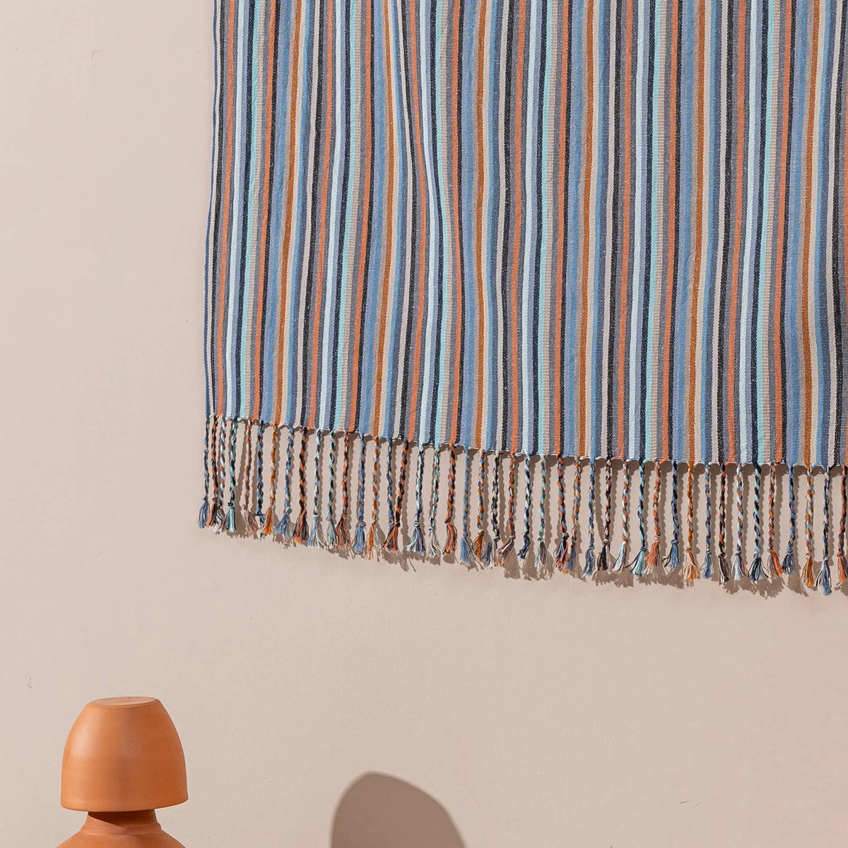 Rust & Denim Stripe beach towel folded | Kikoya