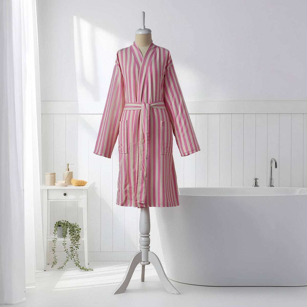 Pink zebra stripe Turkish cotton bathrobe in a bright bathroom | Kikoya