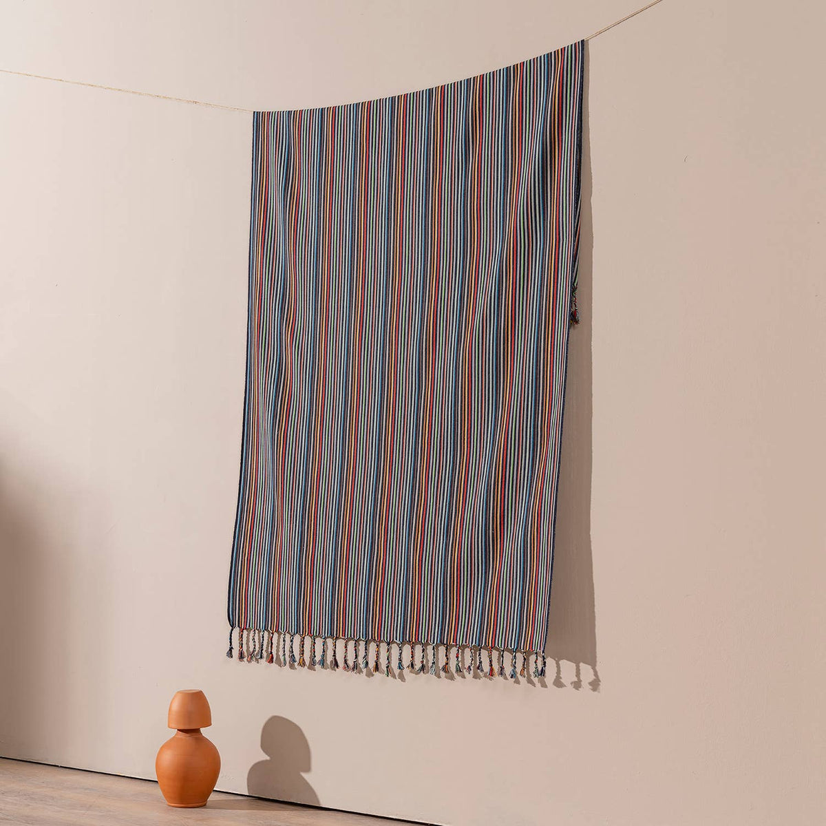 Premium rustic Turkish beach towel in fine multicolour stripes on slate | Kikoya