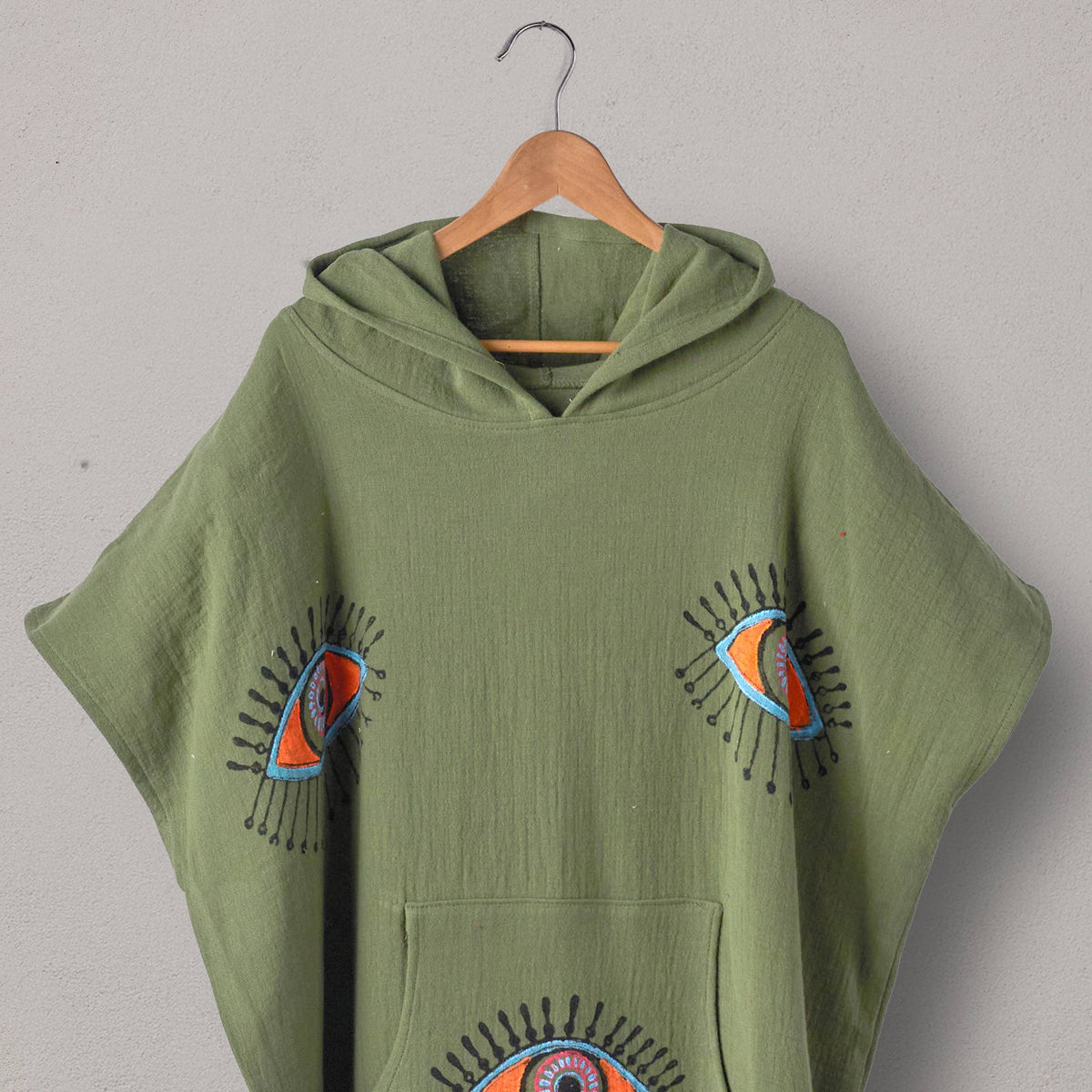 Block-print Eye Adult Hooded Changing Poncho – Print, back view | Kikoya