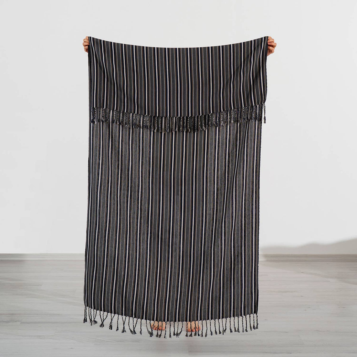 Graphite pinstripe Turkish peshtemal held open, 40x70 in | Kikoya
