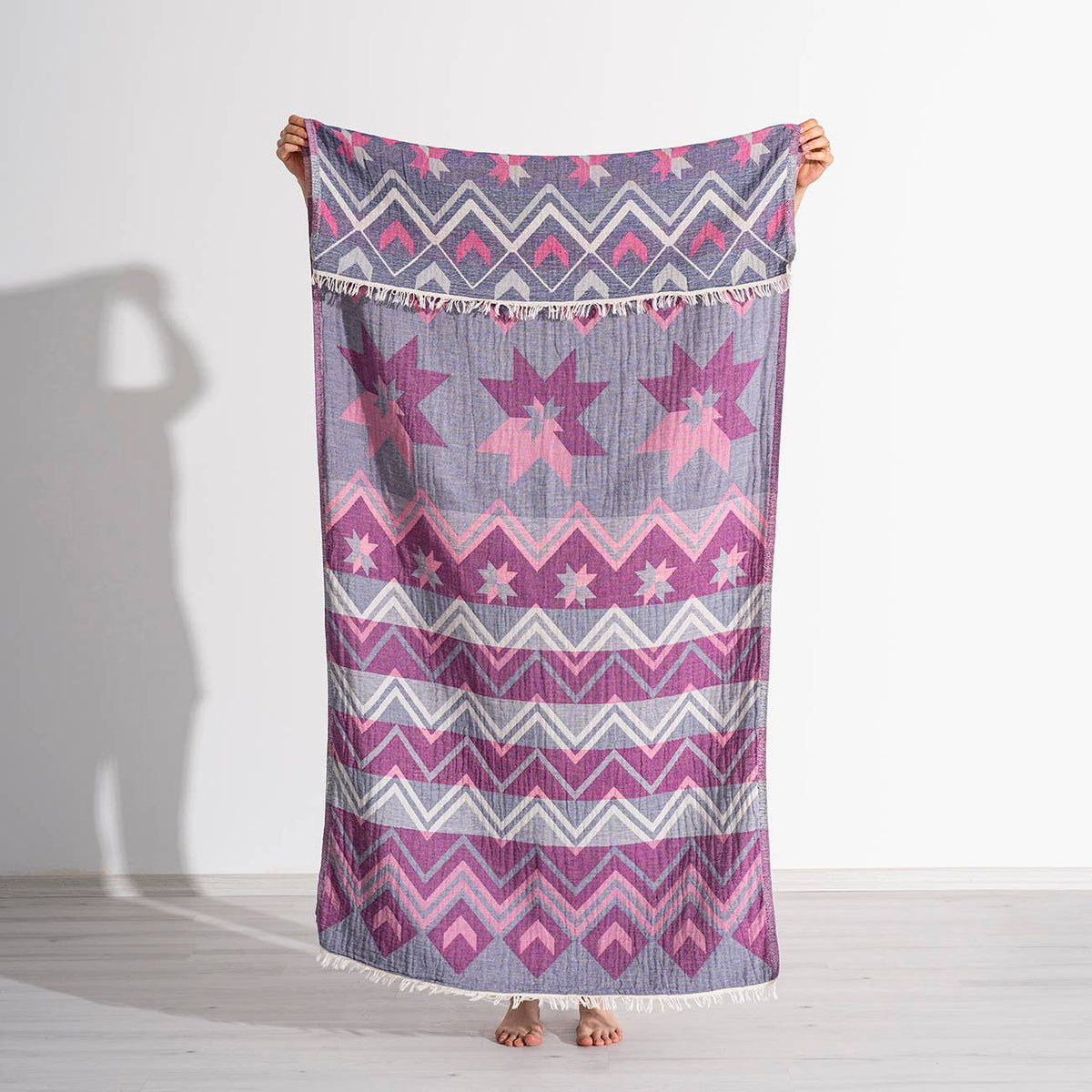 Ethnic print Turkish beach towel in pink and purple, 33x66 in | Kikoya
