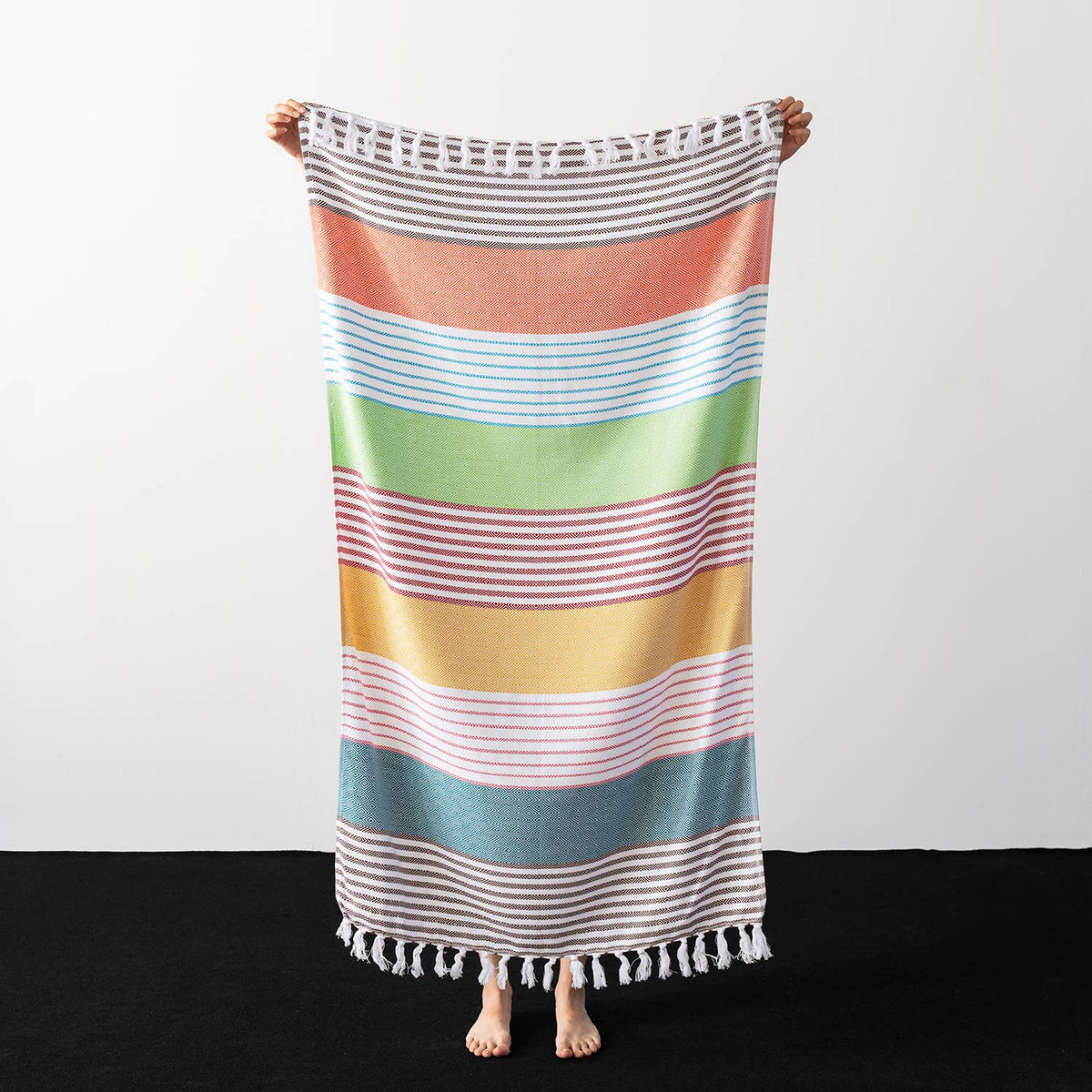 Herringbone Turkish towel – Multicolor, folded with fringe | Kikoya