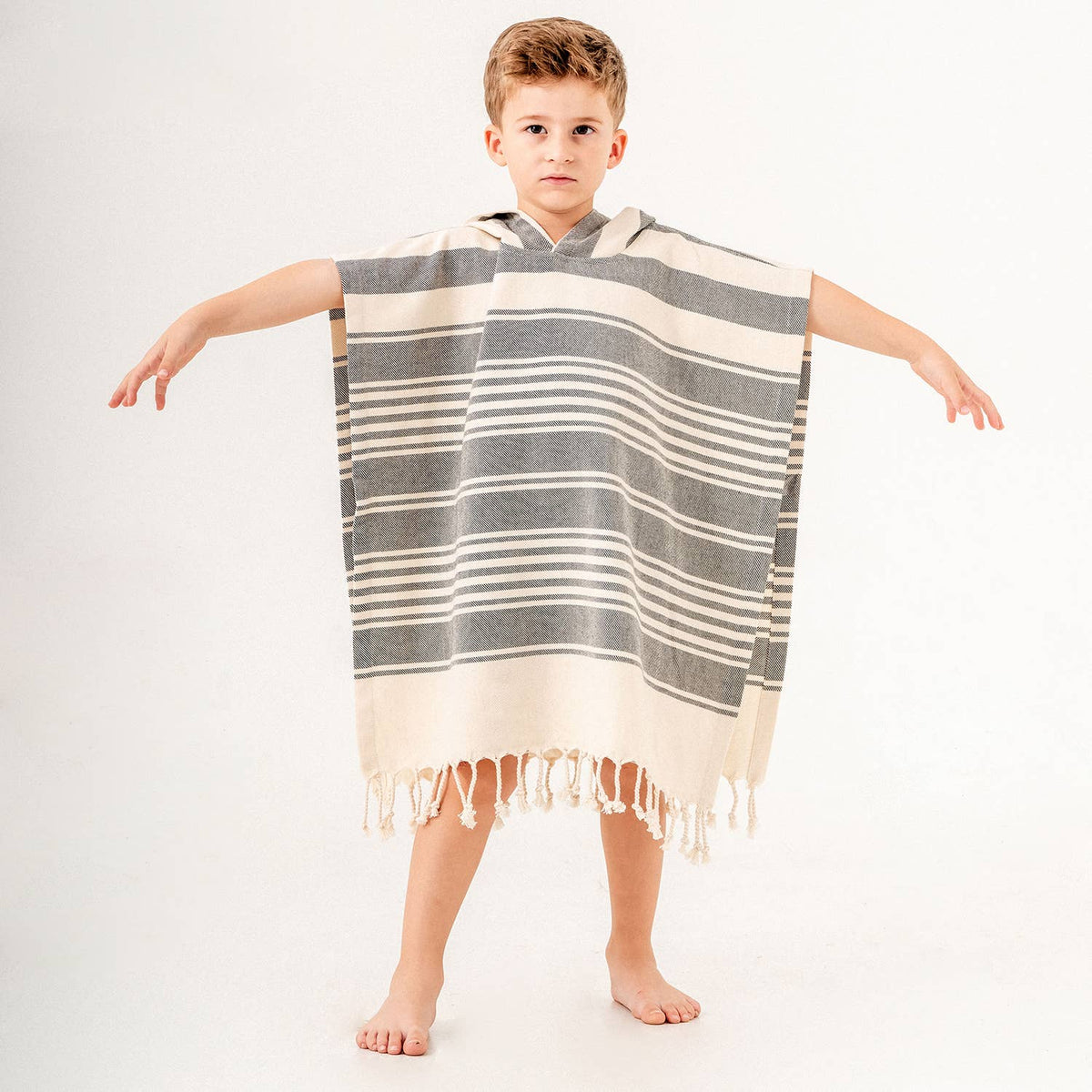 Anatolia Kids Hooded Towel Poncho – Stripe, styled view | Kikoya