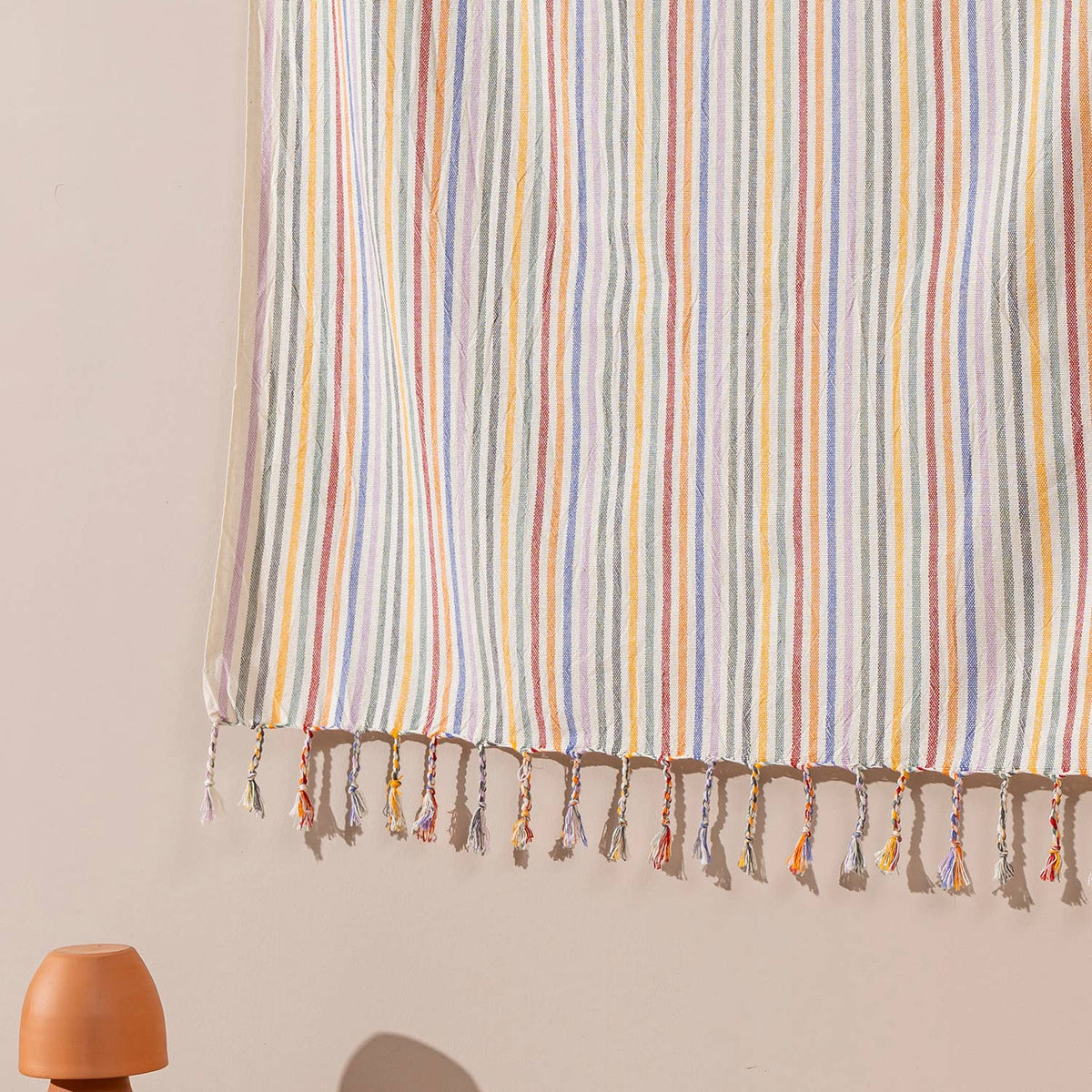 Lilac Rainbow Stripe beach towel folded | Kikoya