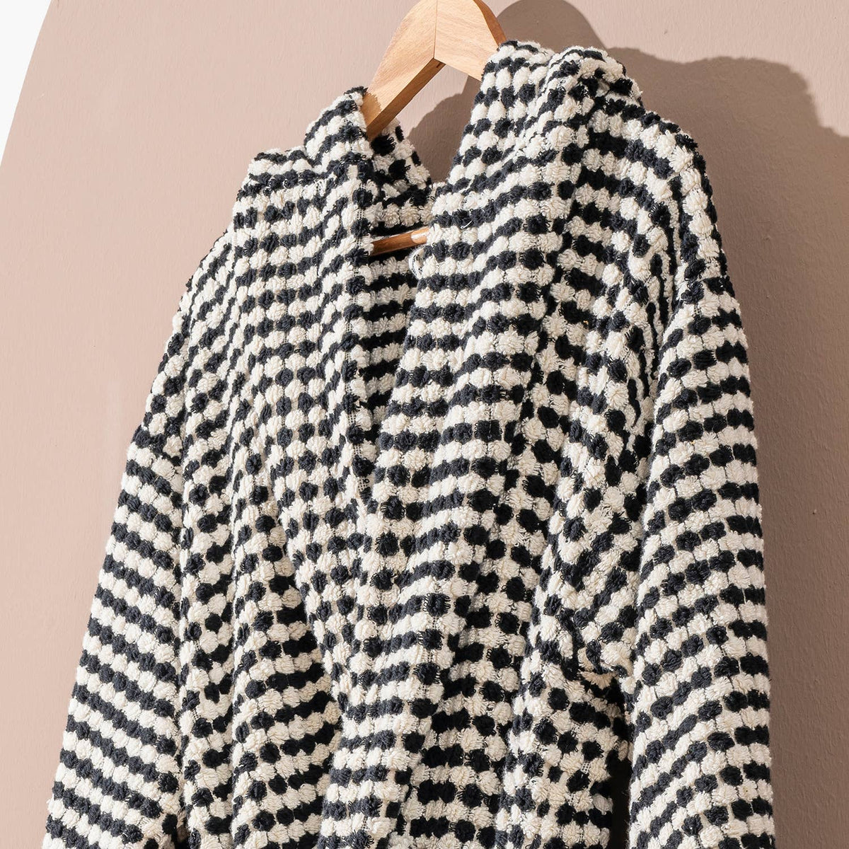 Pompom Turkish bathrobe – Black & White, Hooded, styled view | Kikoya