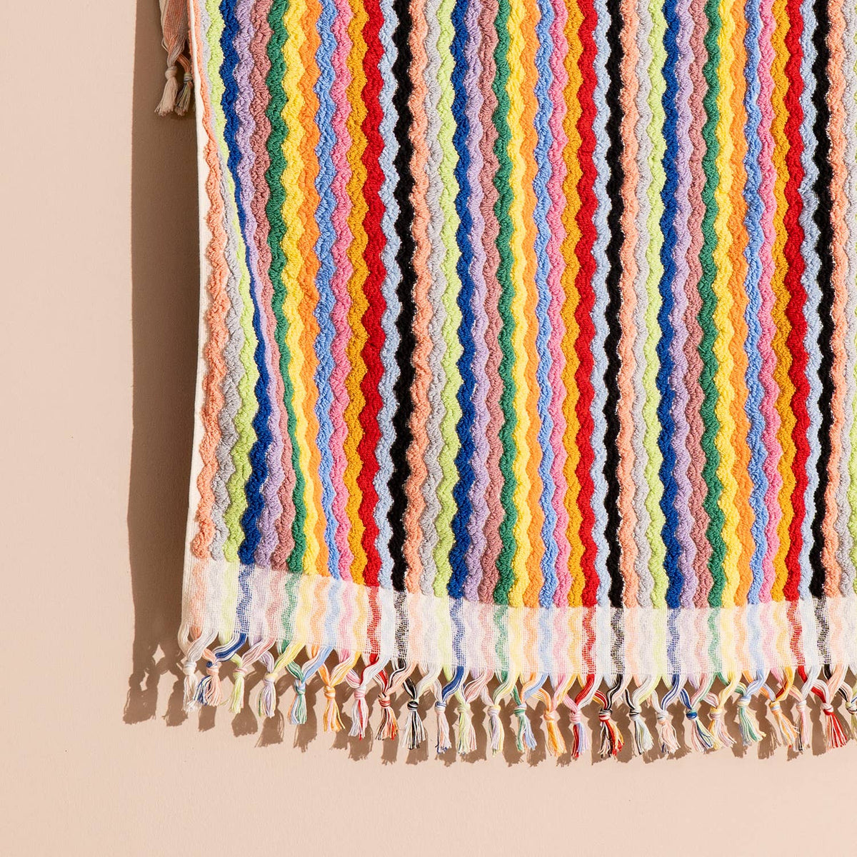 Pompom zigzag Turkish bath towel, 35x68 in, handloomed chevron with pompom fringe | Kikoya
