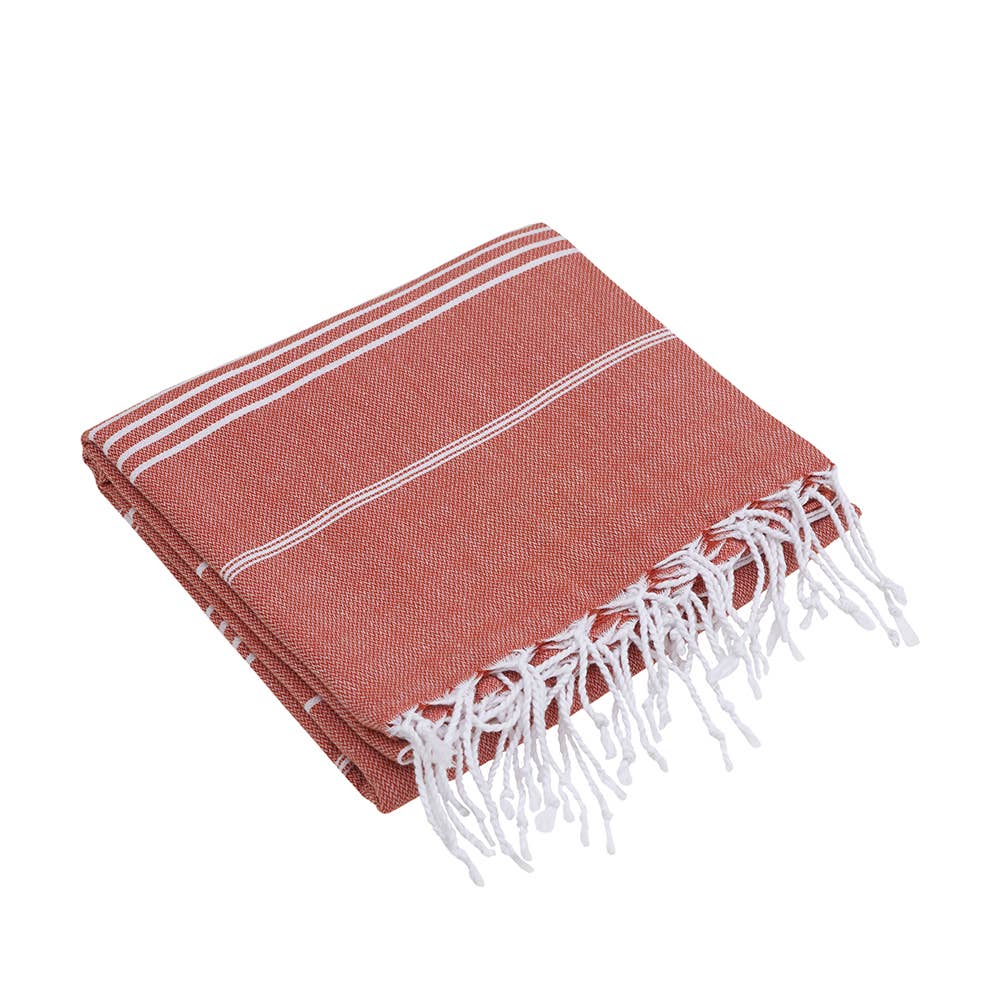 Sultan Turkish beach towel – Clay, folded with knotted fringe | Kikoya