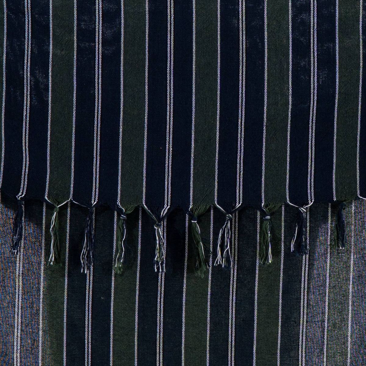 Close-up of the rustic flat weave and cream pinstripes on ink navy cotton | Kikoya