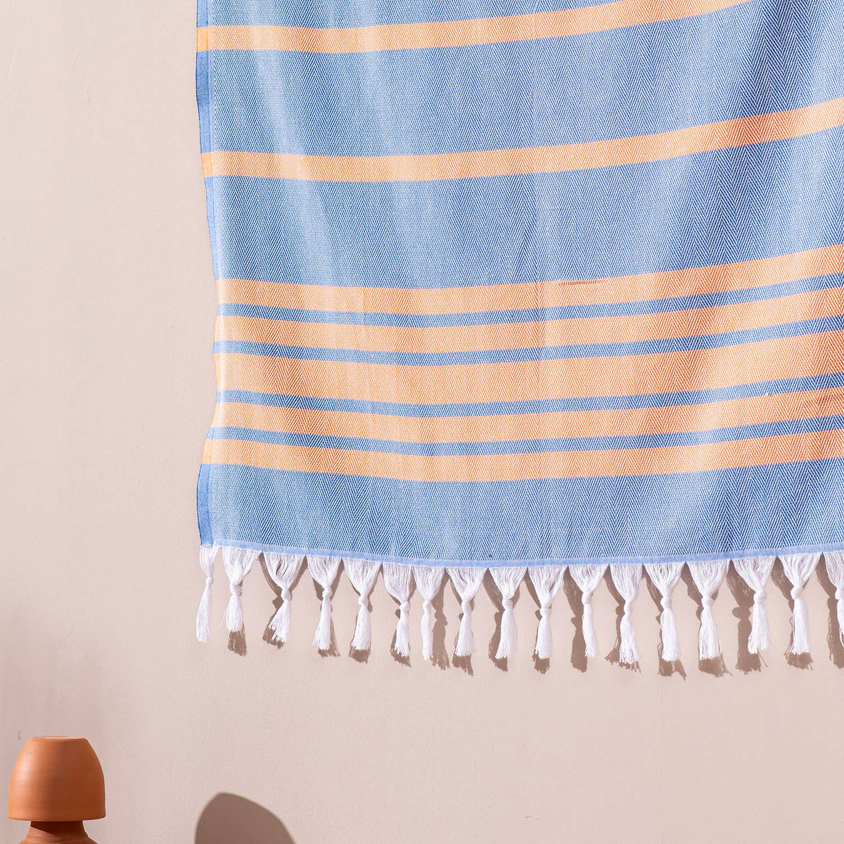 Luxe Herringbone Turkish towel – Blue/Orange, blue with orange stripes, close-up | Kikoya
