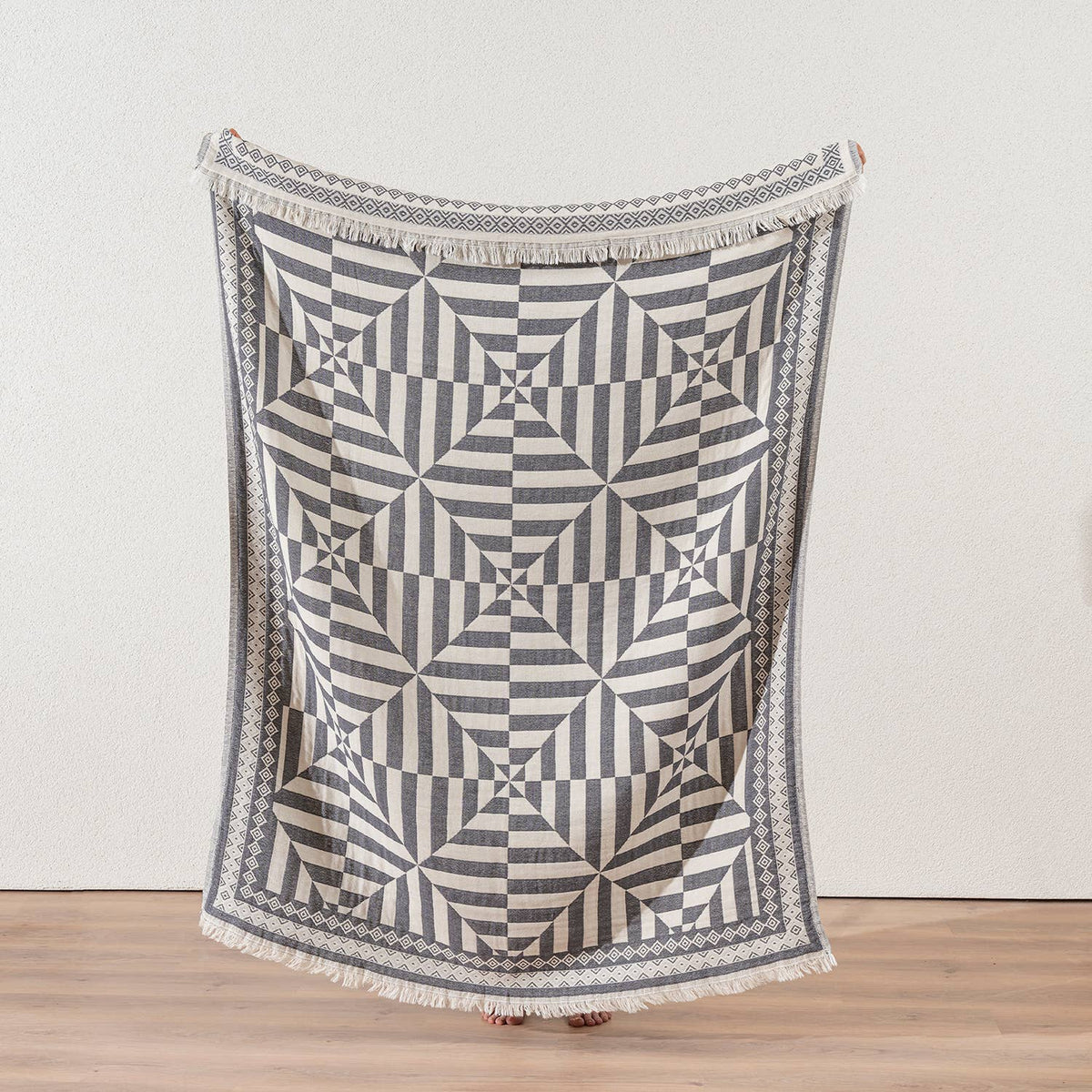 Geo Turkish cotton throw blanket – optic pinwheel, full length view | Kikoya