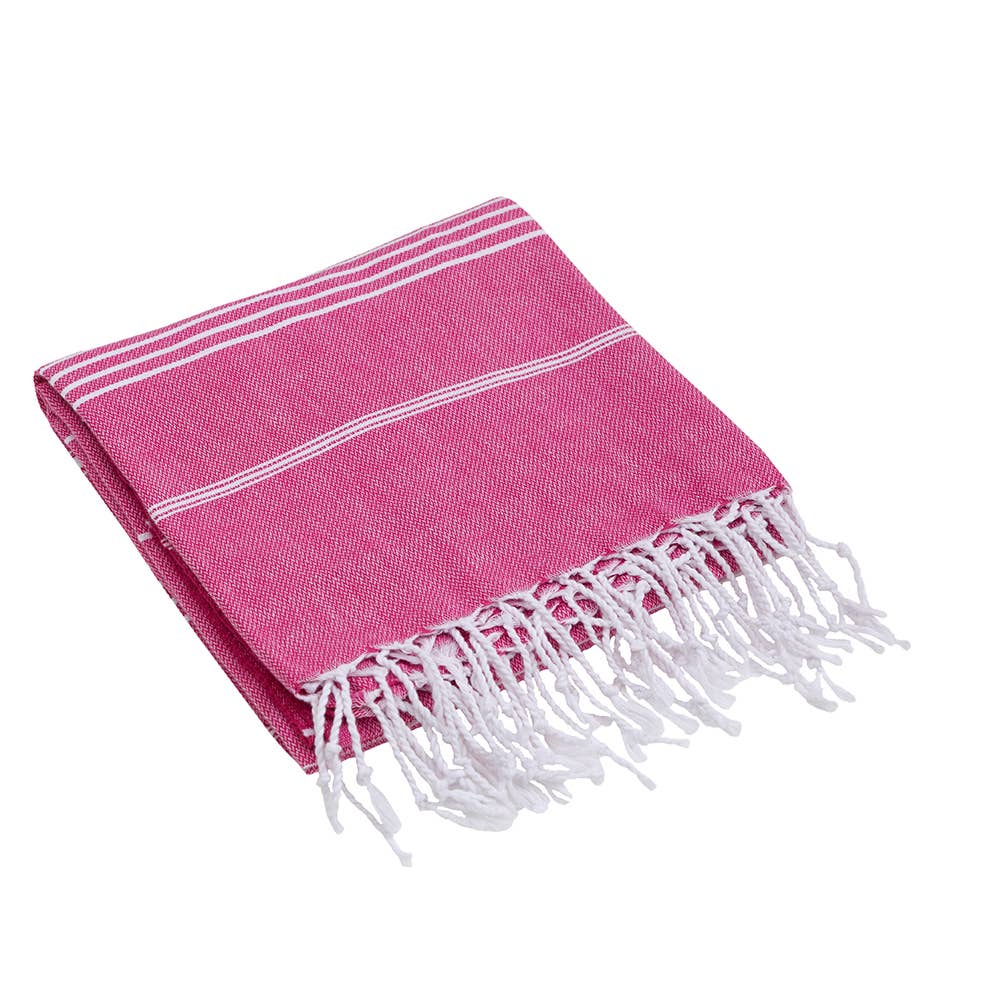 Sultan Turkish beach towel – Fuchsia, folded with knotted fringe | Kikoya