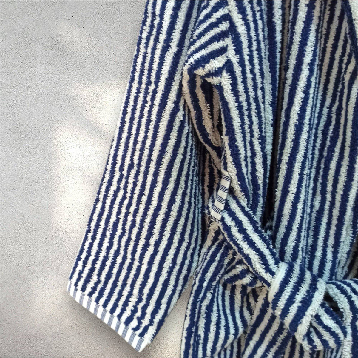 Pompom Turkish bathrobe – Navy & White Stripe, Hooded, lifestyle view | Kikoya