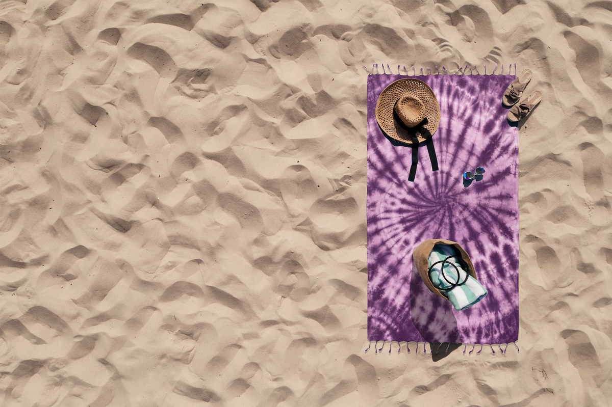 Tie-dye Turkish beach towel in plum and purple spiral, 33x65 in | Kikoya