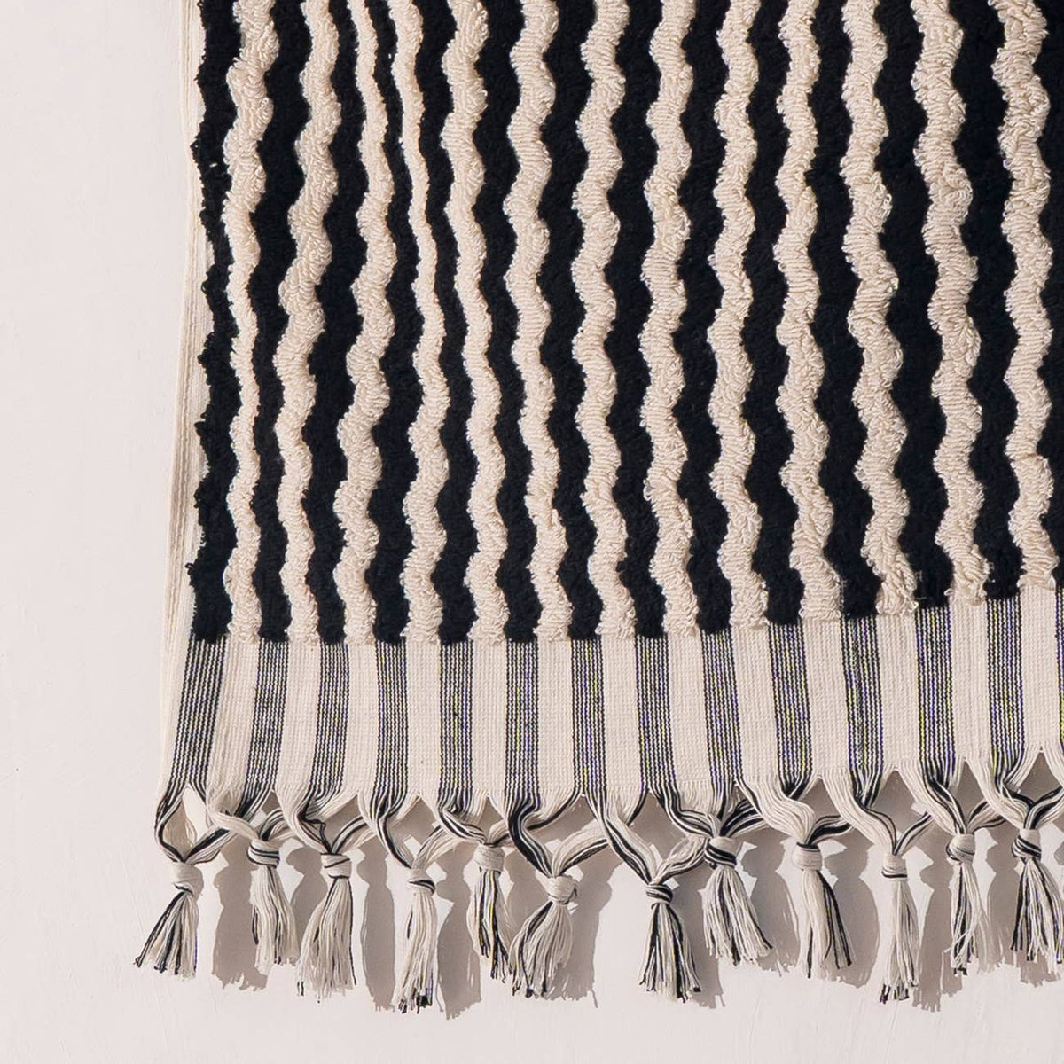 Pompom zigzag Turkish hand towel in black and natural, 17x38 in, handloomed | Kikoya