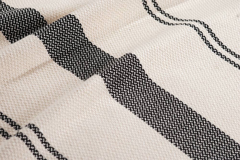 Wide stripe Turkish cotton bedspread – black on cream, tassel detail | Kikoya