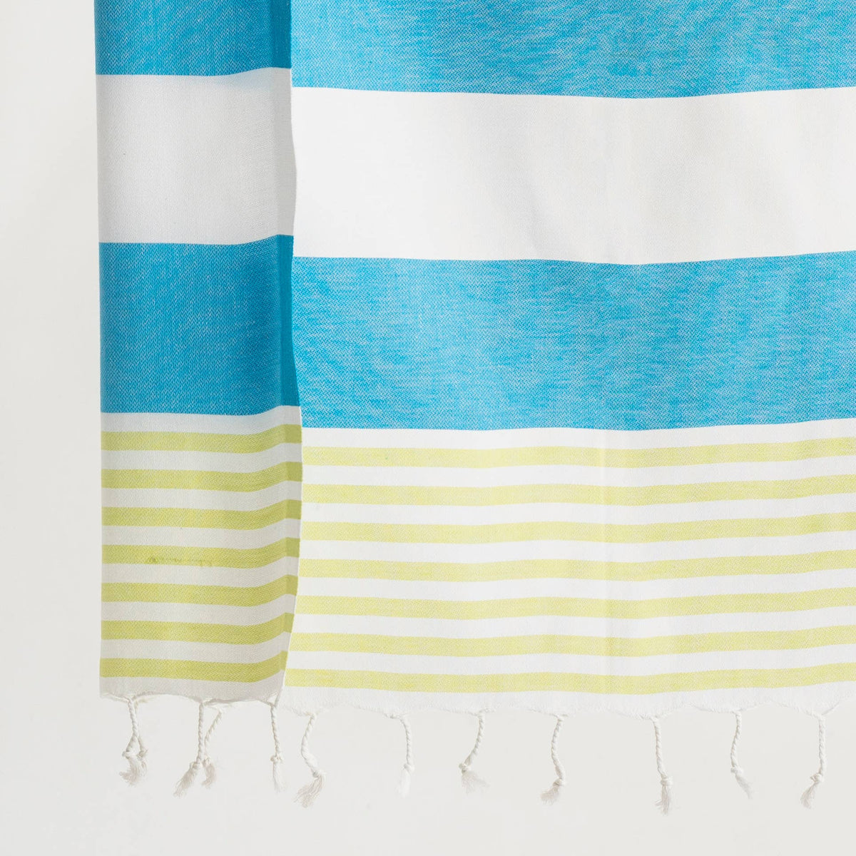 Turquoise and lime cabana stripe peshtemal, fringe detail | Kikoya
