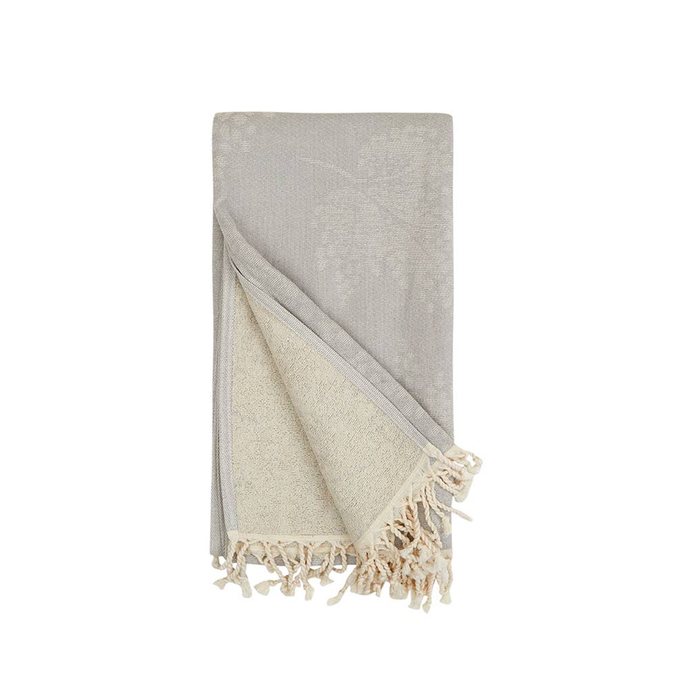 Leaves terry-backed Turkish towel with tonal leaf jacquard in grey | Kikoya