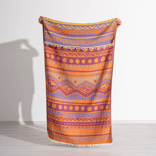 Ethnic jacquard Turkish beach towel in orange and purple, flat-woven | Kikoya