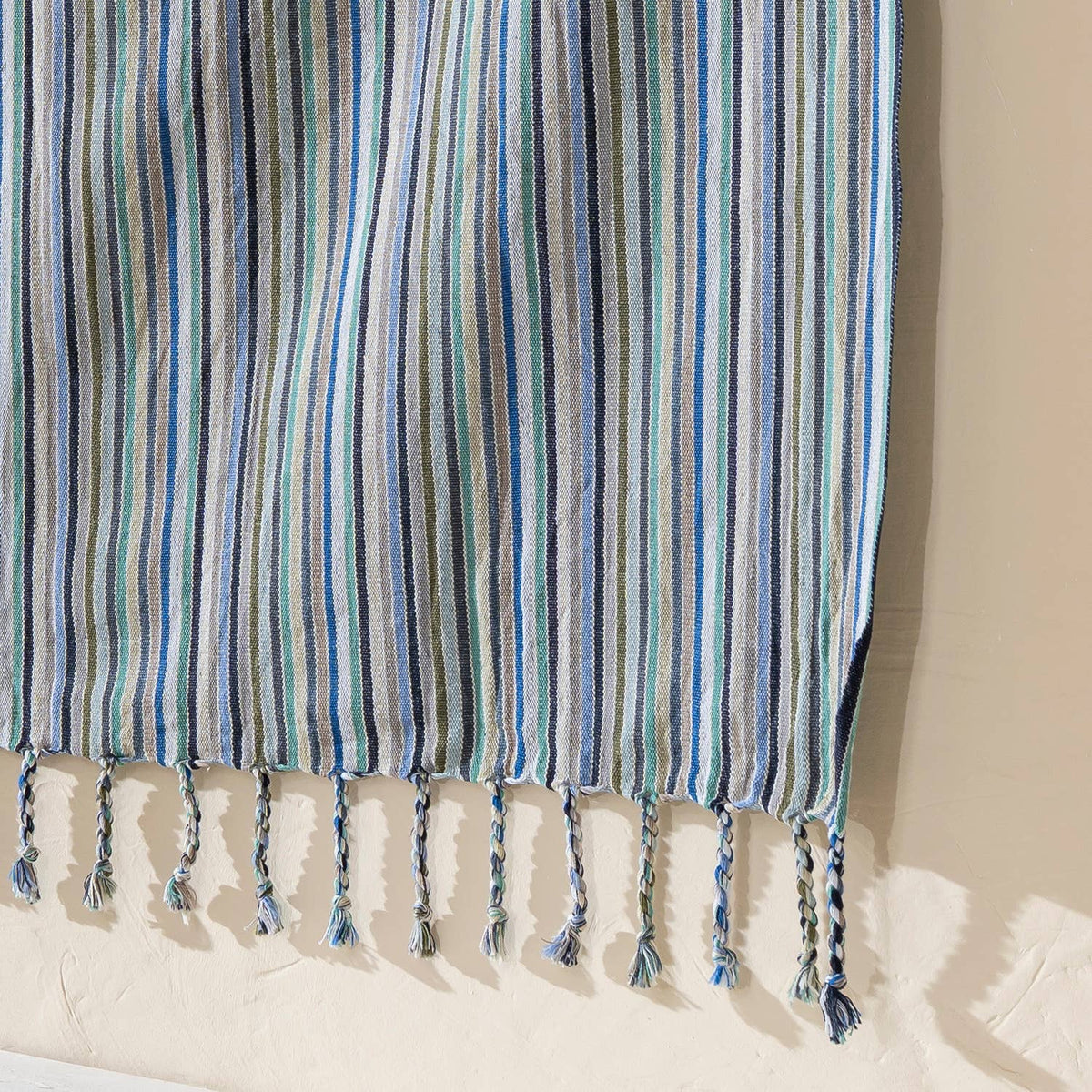 Aqua & Navy Stripe beach towel folded | Kikoya
