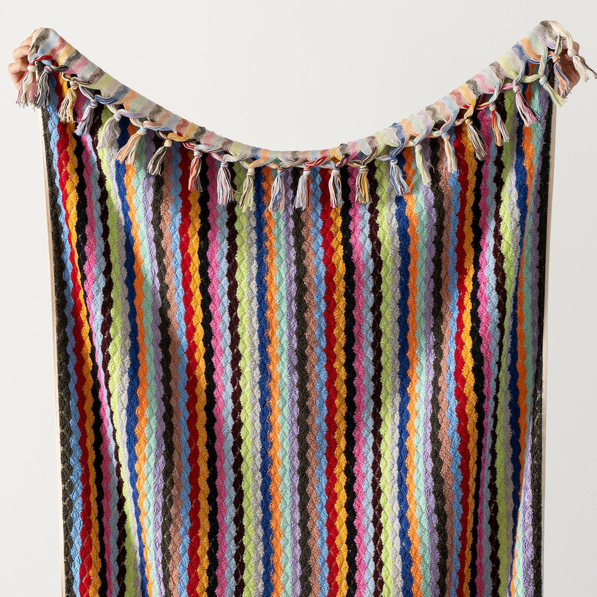 Pompom zigzag Turkish bath towel, 35x68 in, handloomed chevron with pompom fringe | Kikoya