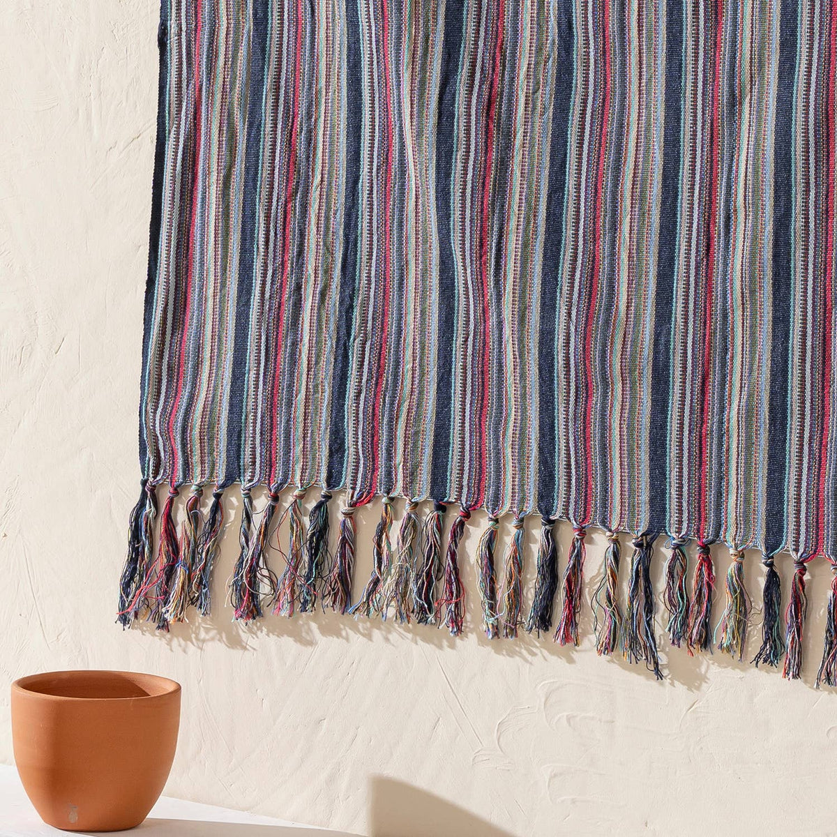 Indigo & Red Stripe beach towel folded | Kikoya