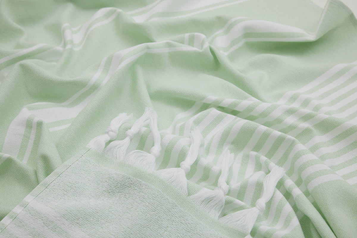Arma terry-backed Turkish towel in fine green pinstripe | Kikoya