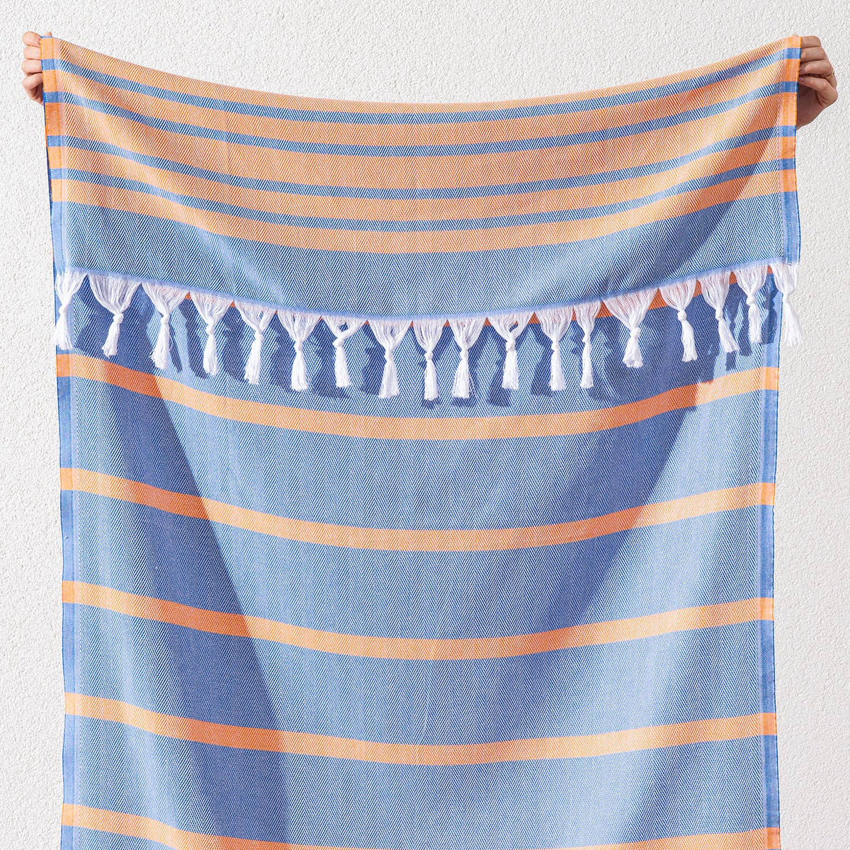 Luxe Herringbone Turkish towel – Blue/Orange, blue with orange stripes, fringe detail | Kikoya