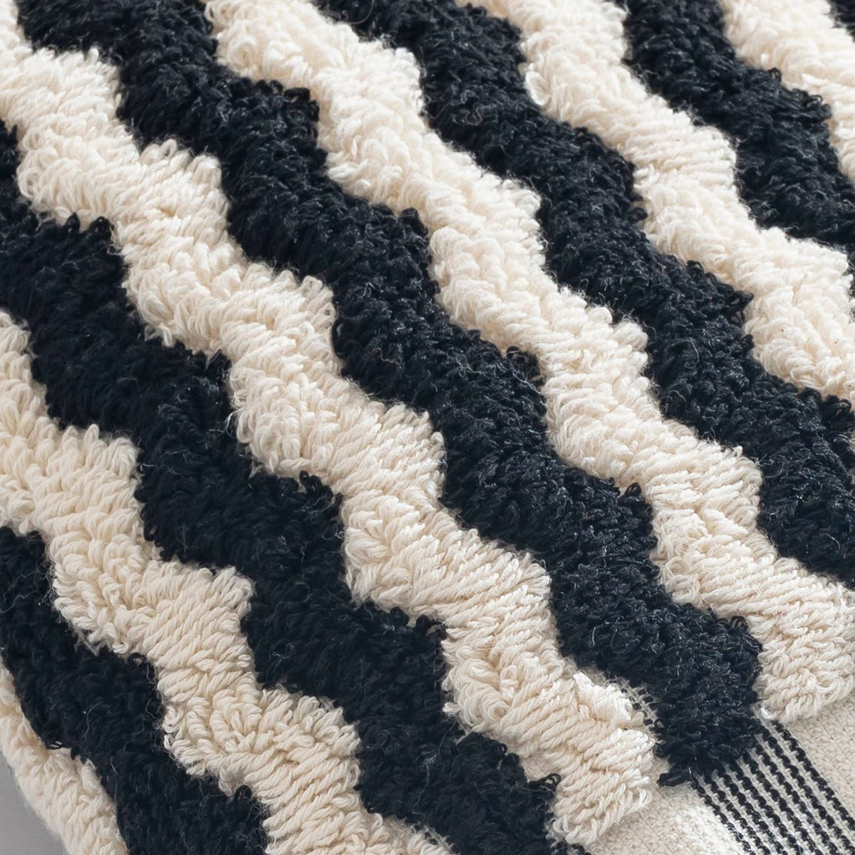 Pompom zigzag Turkish hand towel in black and natural, 17x38 in, handloomed | Kikoya