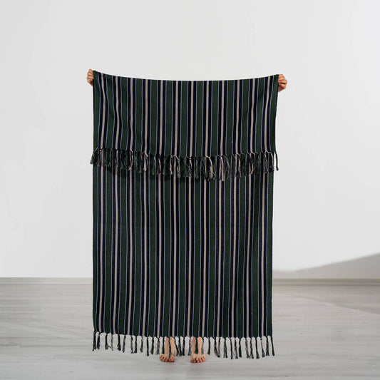 Premium Rustic Turkish beach towel in forest green with navy and cream pinstripes, held open, 40x70 in | Kikoya