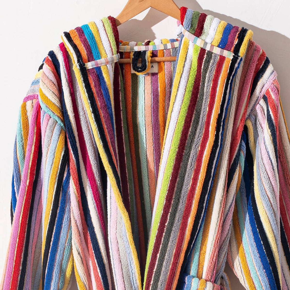 Pompom Turkish bathrobe – Bold Multicolor Stripe, Hooded, styled view | Kikoya