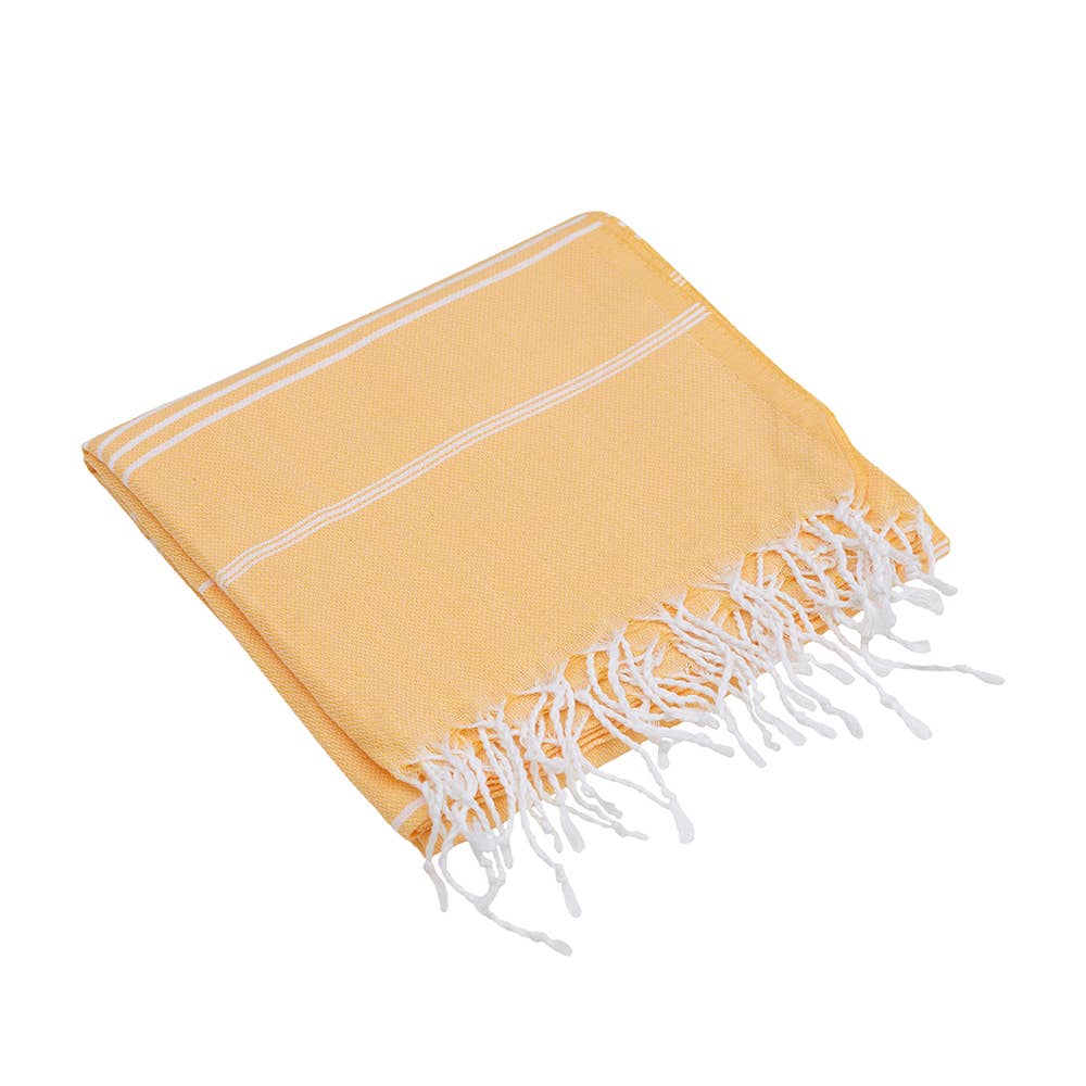 Sultan Turkish beach towel – Pale Yellow, folded with knotted fringe | Kikoya