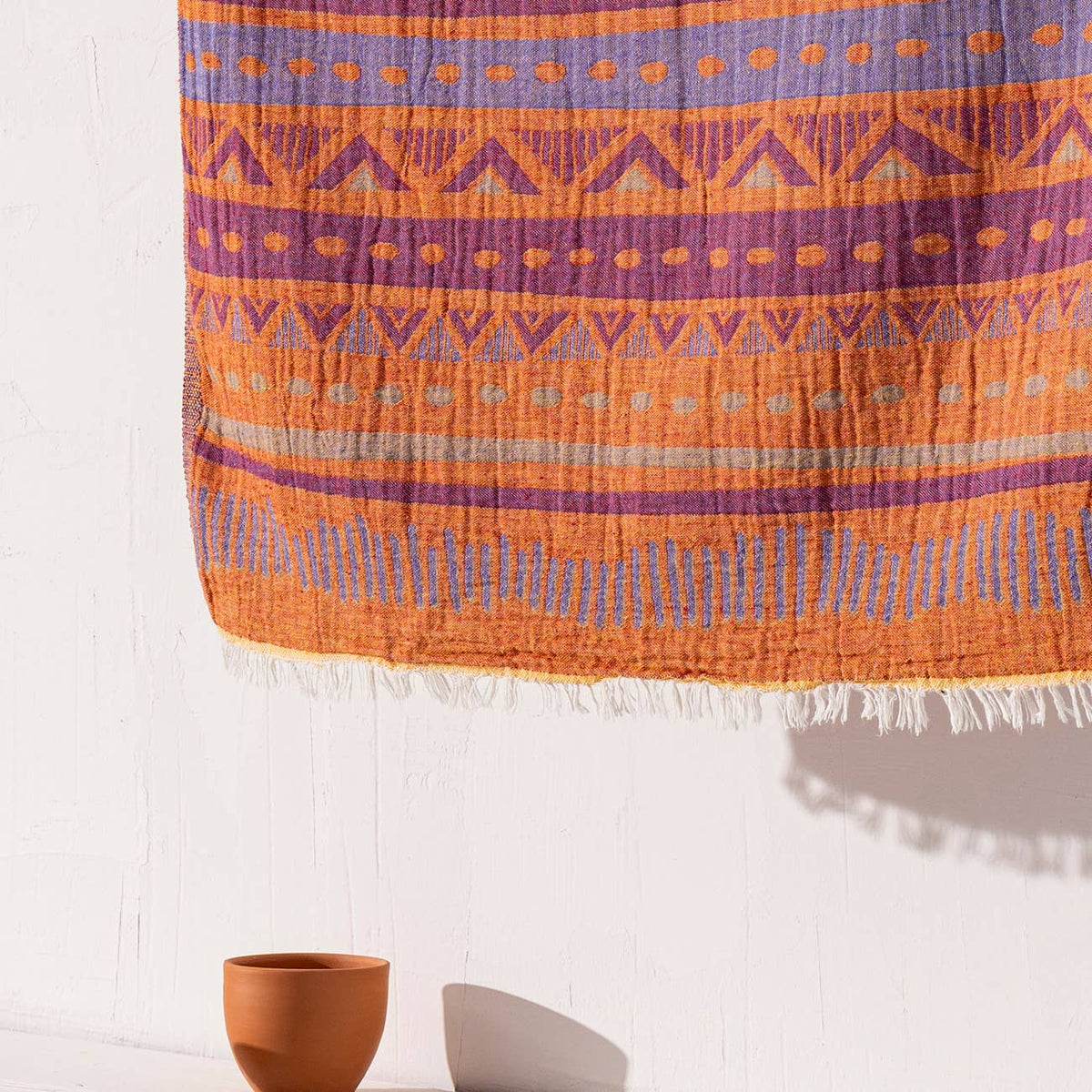 Ethnic jacquard Turkish beach towel in orange and purple, flat-woven | Kikoya