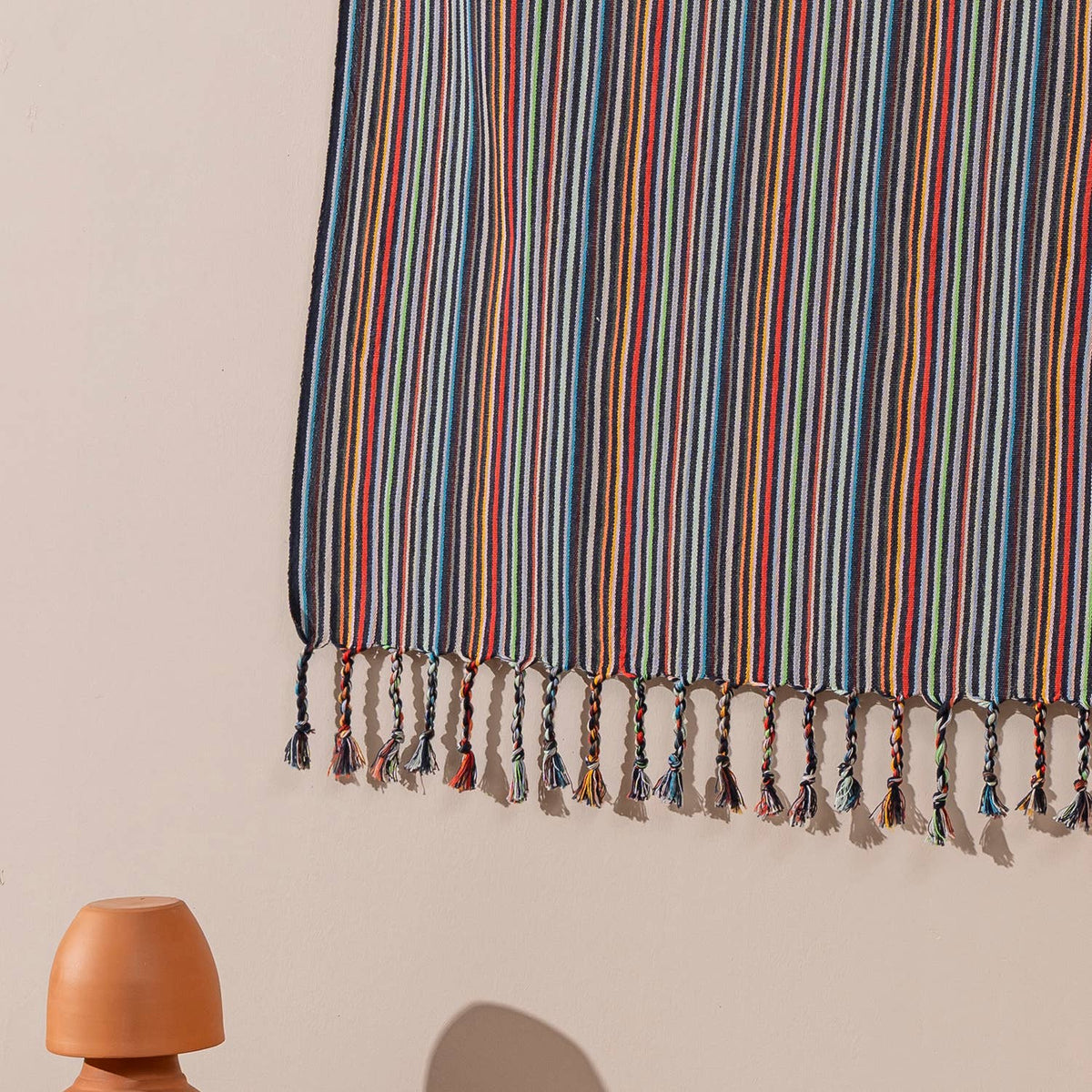Premium rustic Turkish beach towel in fine multicolour stripes on slate | Kikoya