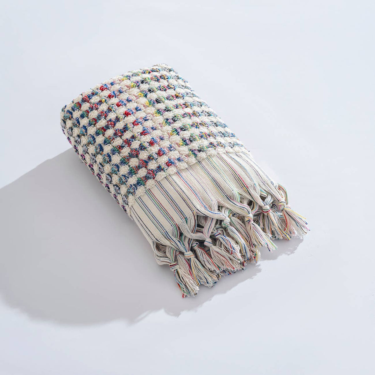 Handloomed Turkish hand towel with multicolour pompoms, 17x38 in | Kikoya