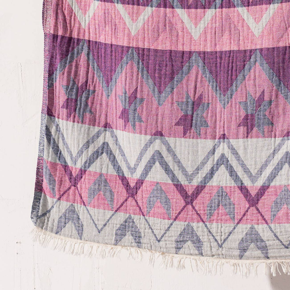 Ethnic print Turkish beach towel in pink and purple, 33x66 in | Kikoya