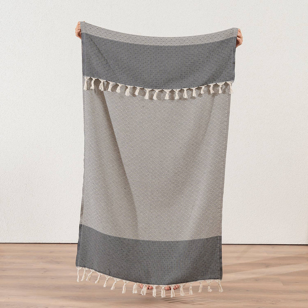 Topkapi Turkish beach towel in black diamond weave with contrast band and tassel fringe, 33x66 in | Kikoya