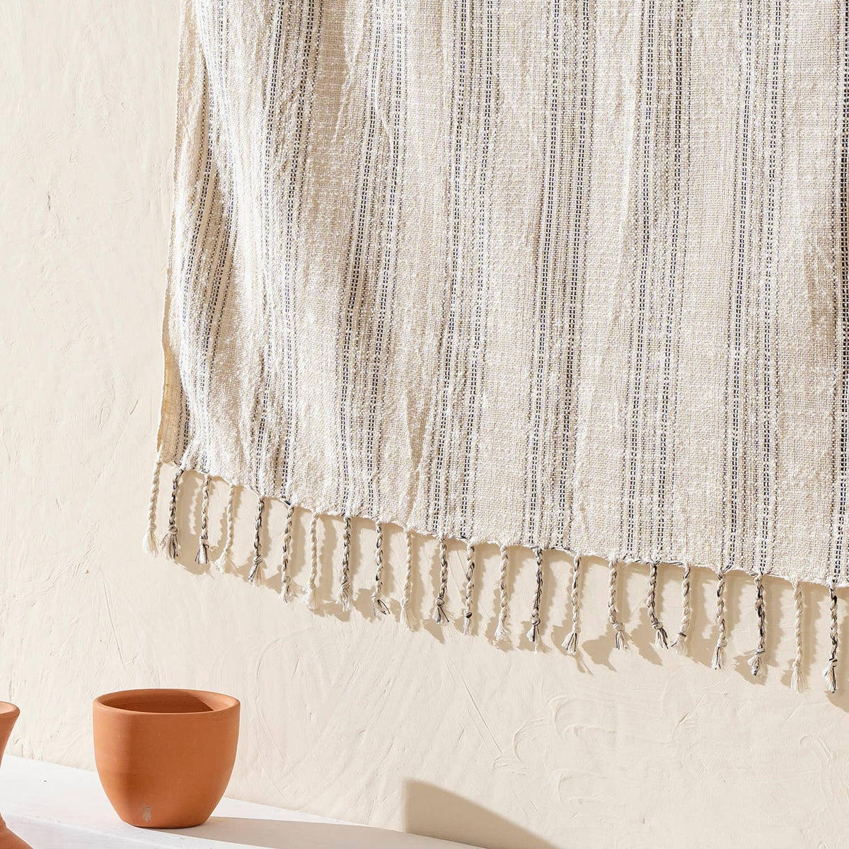 Premium Rustic Turkish beach towel – White & Grey Pinstripe, styled view | Kikoya