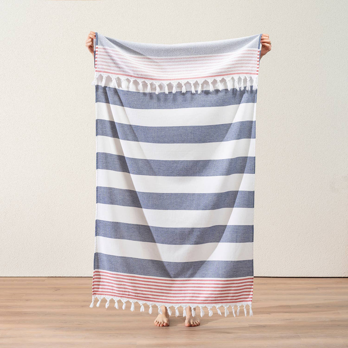Navy and white block stripe terry-backed Turkish towel with red tassels | Kikoya
