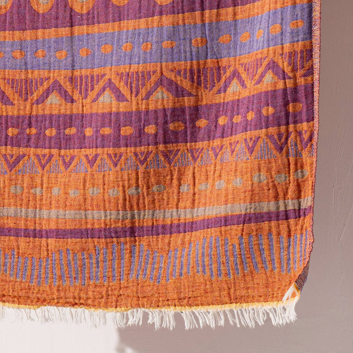 Ethnic jacquard Turkish beach towel in orange and purple, flat-woven | Kikoya