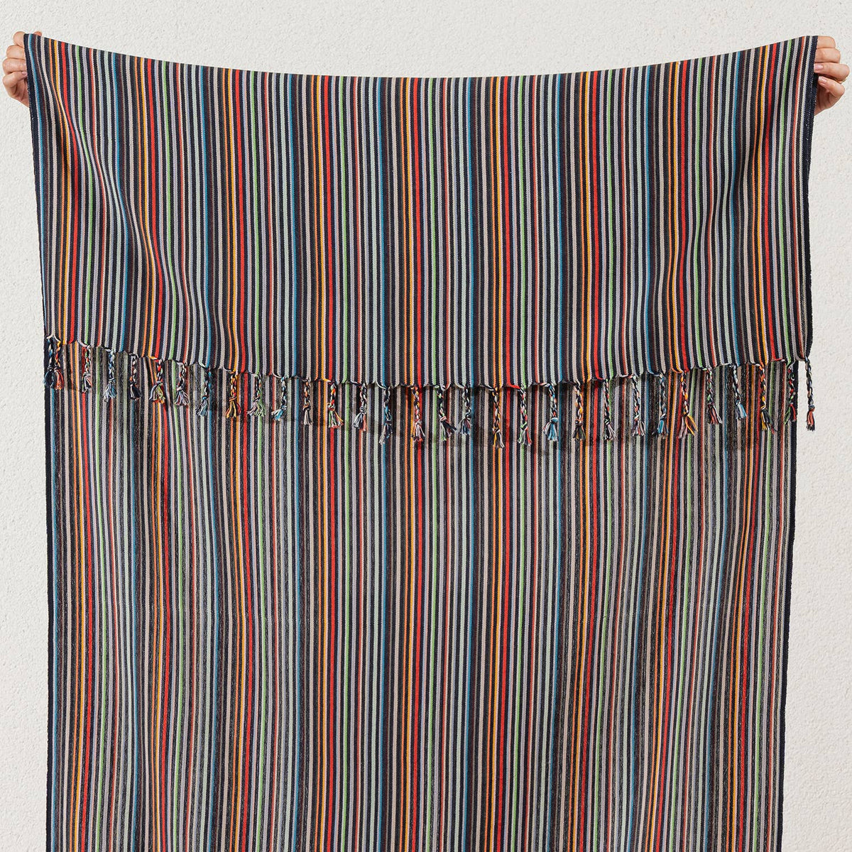 Premium rustic Turkish beach towel in fine multicolour stripes on slate | Kikoya
