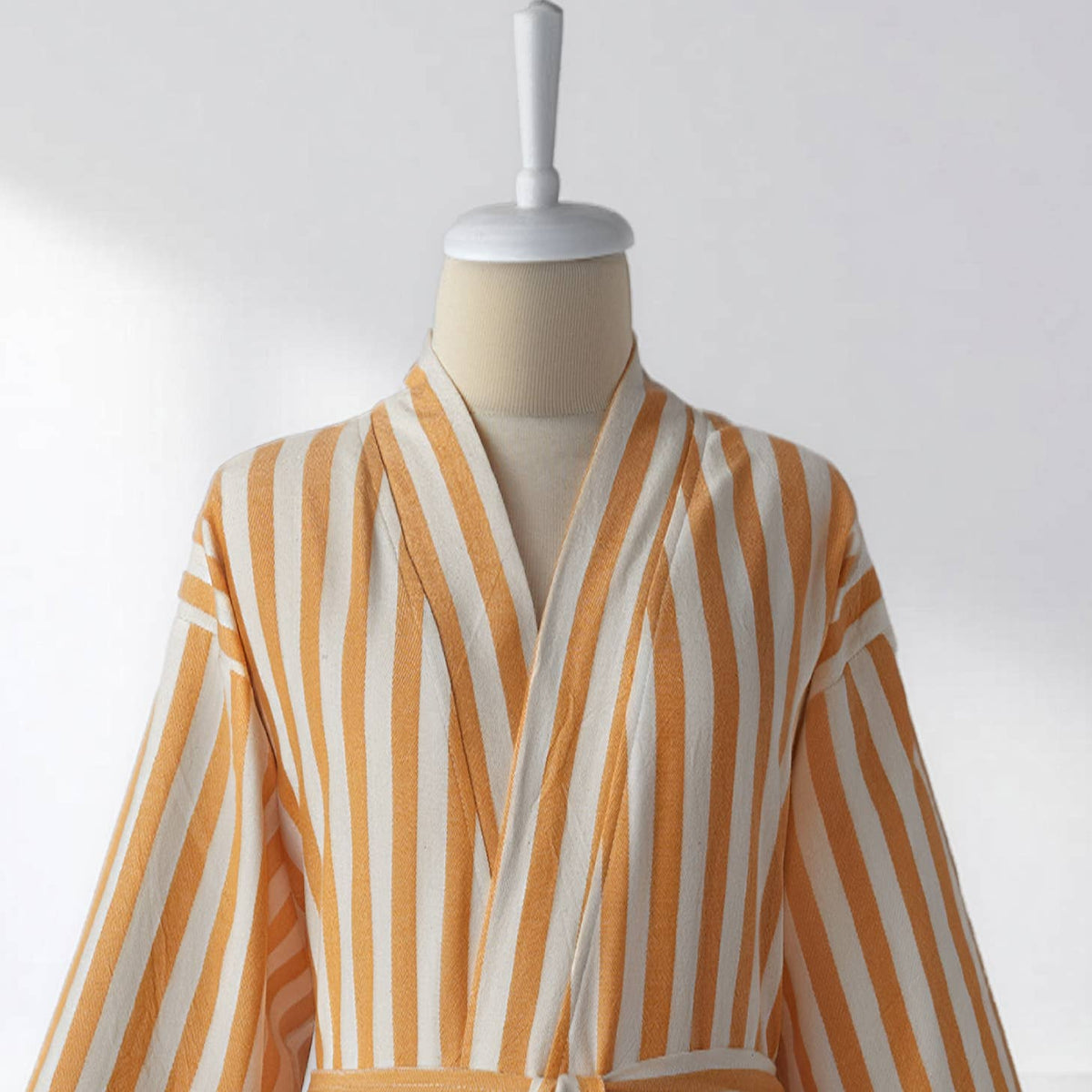 Kimono collar detail of the yellow and cream zebra stripe bathrobe | Kikoya