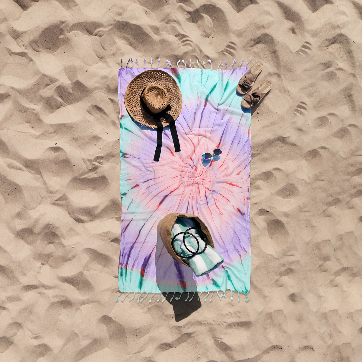 Tie-dye Turkish beach towel in pastel spiral, 33x65 in, sand-shedding flat weave | Kikoya