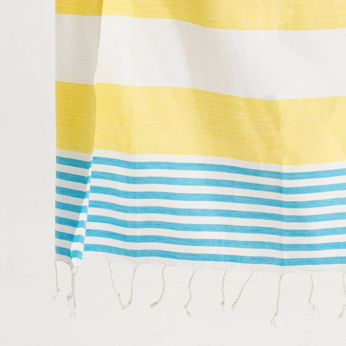 Yellow and turquoise cabana stripe peshtemal, fringe detail | Kikoya