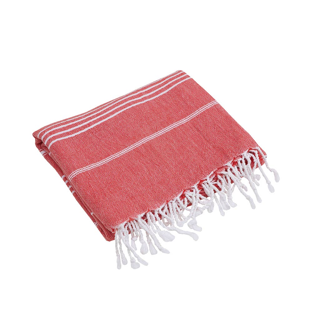 Sultan Turkish beach towel – Dark Orange, folded with knotted fringe | Kikoya